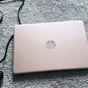 HP Pink Laptop with Silver Logo